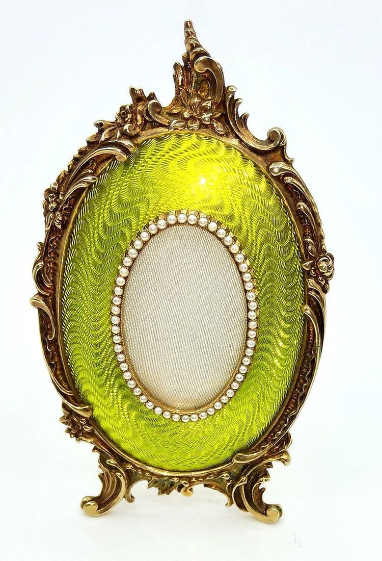 Faberge Russian Silver Gold Plated Guilloche Enamel Photo Frame, Mint Green Enamel With Pearls: Russian guilloche enamel silver gold plated picture frame.Hallmark: 925 and Cytilic stamp "VKGI"other brands: 900 (999?) VKGIRegistered inventory number: 124MeasurementsHeight:12cmWidth: 7cmphoto spac