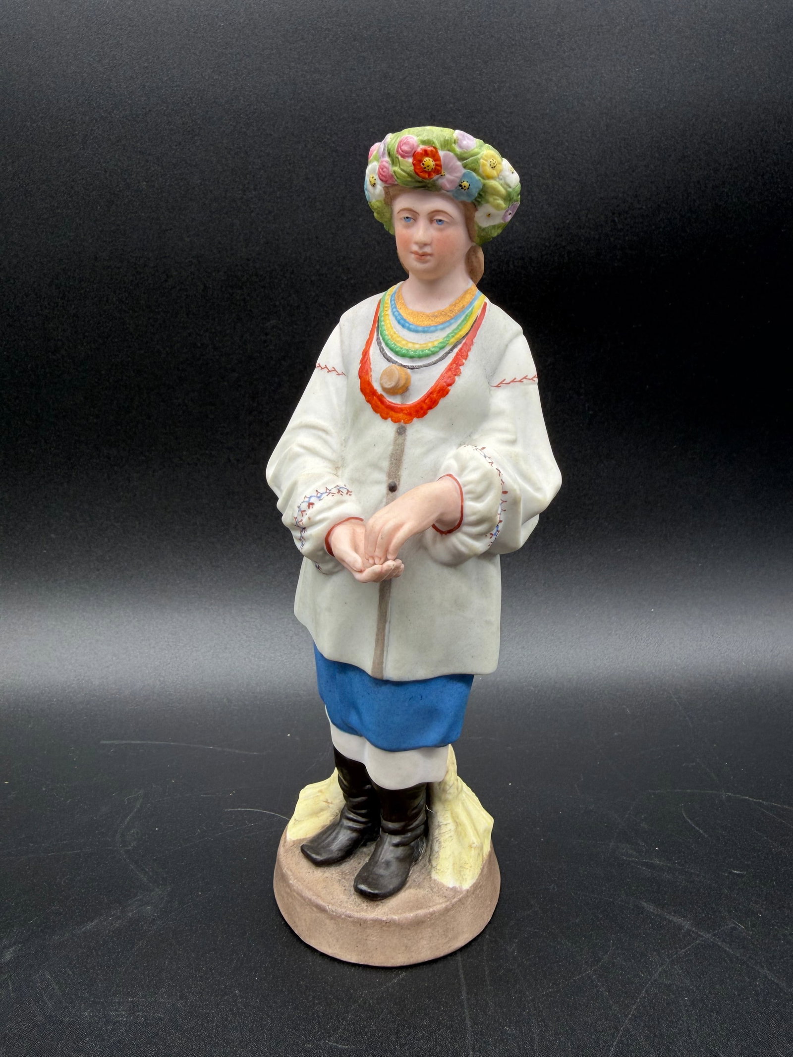 Gardner Manufactory — ‘Woman of Ukraine’, biscuit porcelain, Russia, circa 1870: MANUFACTURE GARDNER, Verbilki (Moscow)Figurine in Hand-Painted Polychrome Porcelain Biscuit Depicting a "Woman of Ukraine" (series "Peoples of Russia"), Represented Vested in a Traditional Costume wit