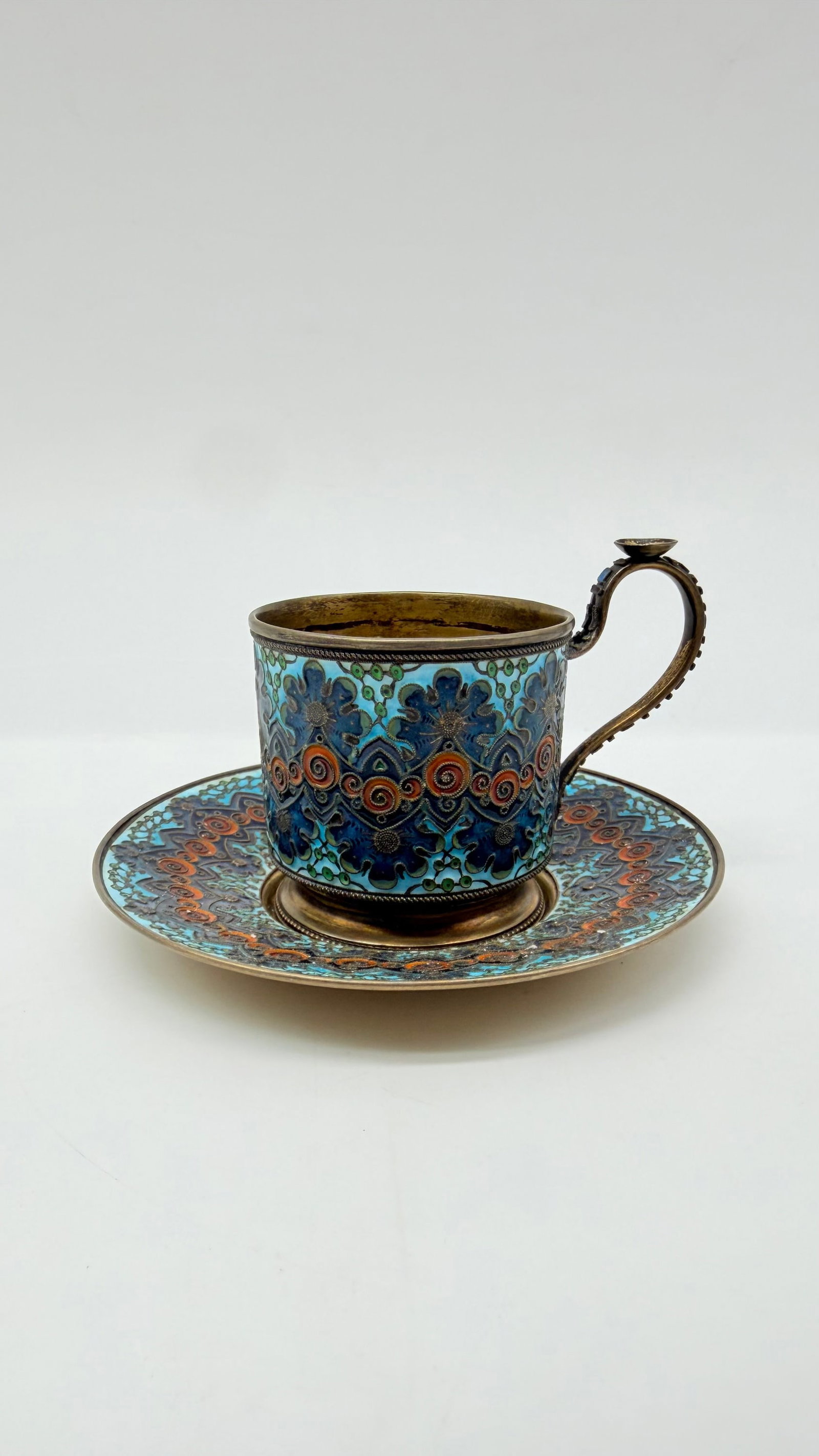 A Russian Silver-Gilt and Cloisonné Enamel Coffee Cup and Saucer, 11 artel, Moscow, 1908–1917 (1 of 16)