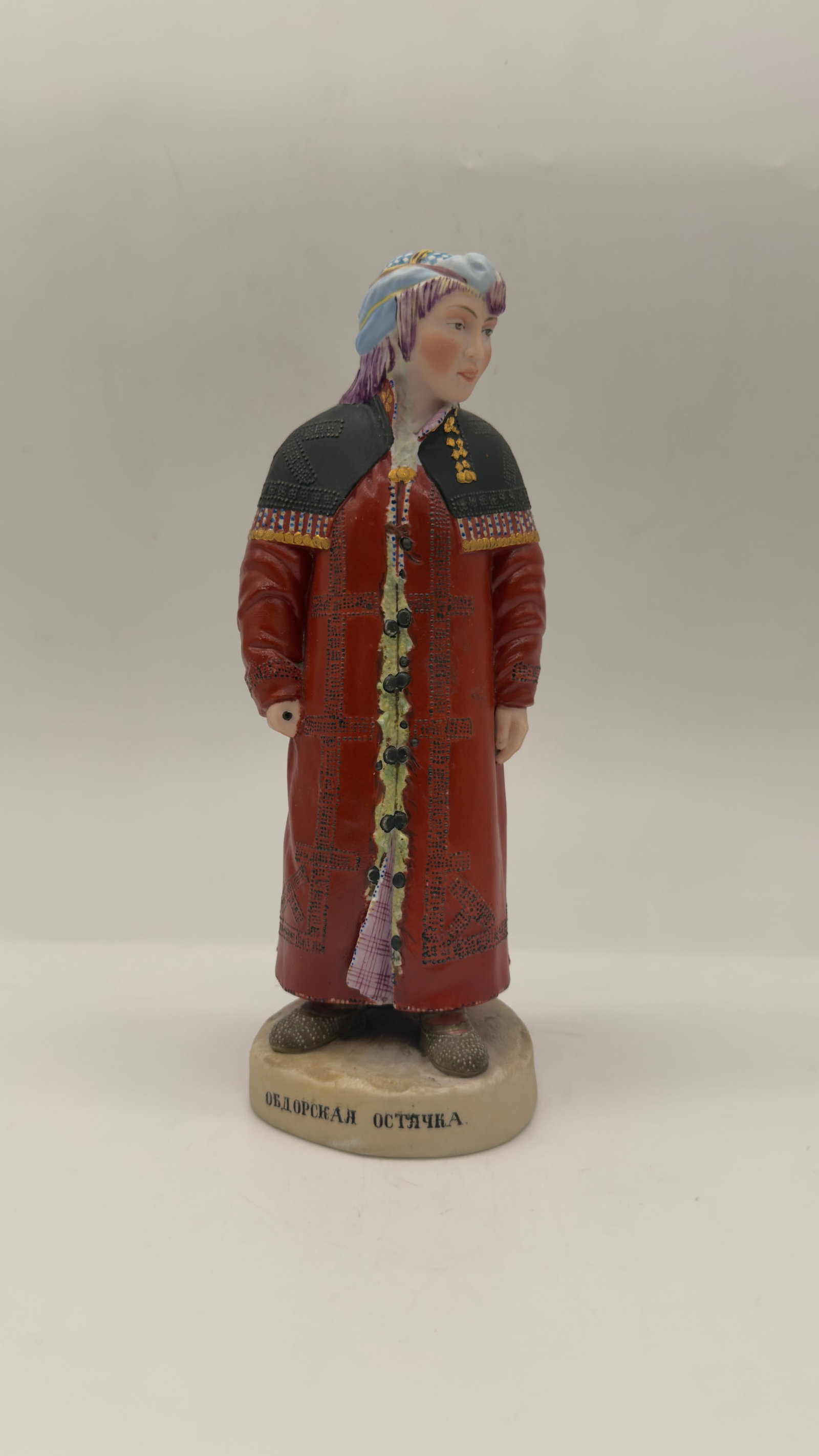 Gardner Manufactory, Verbilki | A Porcelain Figure of an Ostyak Woman of Obdorsk, circa 1880–1890: Gardner Manufactory. "people of Russia" seriesBiscuit and polychrome decorated porcelain figure representing an Ostyak woman from Obdorsk (modern Salekhard, Western Siberia) in traditional costume, we