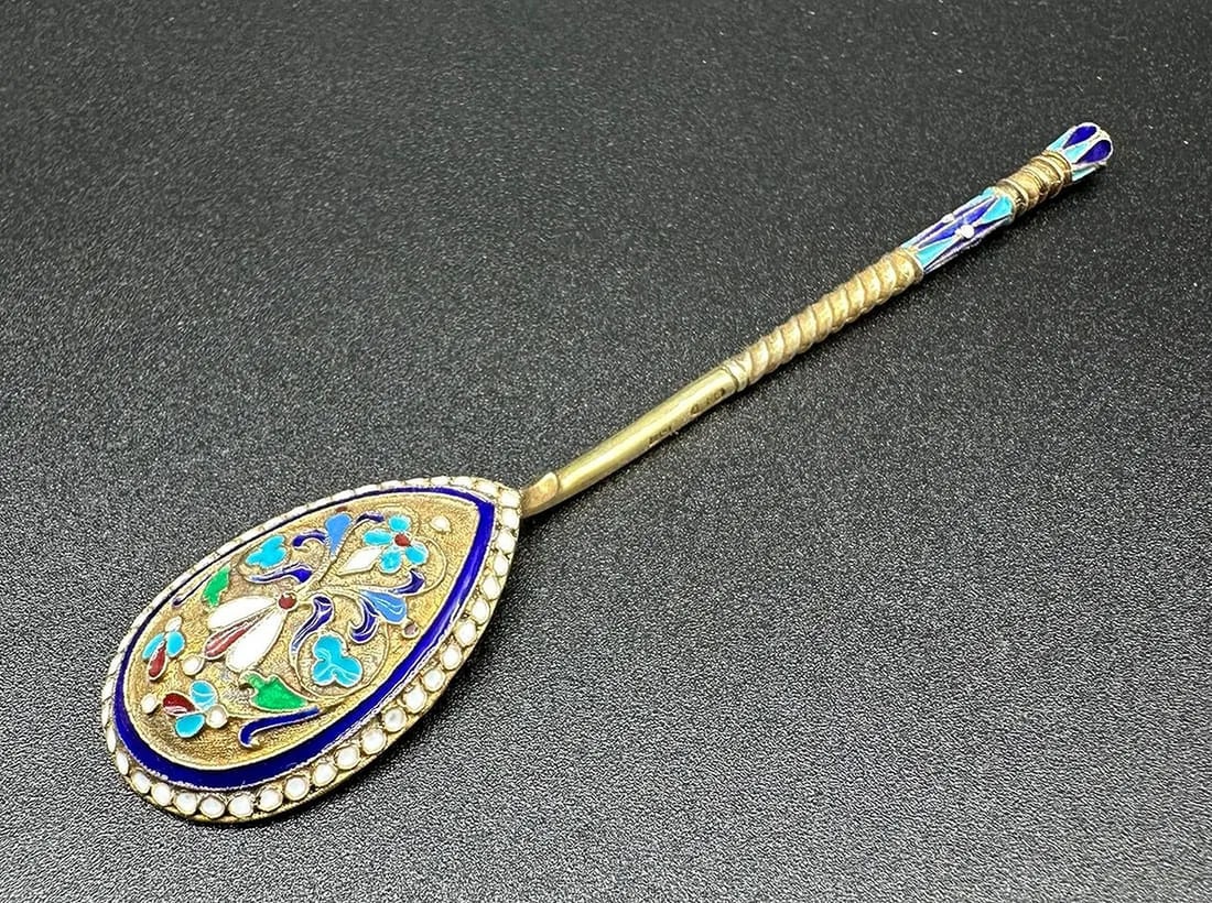 HOUSE OF OVCHINNIKOV: A Russian Silver-Gilt and Cloisonné Enamel Coffee Spoon, Moscow, 1898–1908: MAISON OVCHINNIKOV(attributed to Pavel Ovchinnikov)Silver-gilt coffee or mocha spoon with cloisonné enamel – the reverse of the pear-shaped spoon bowl decorated with polychrome foliage in blue, tur