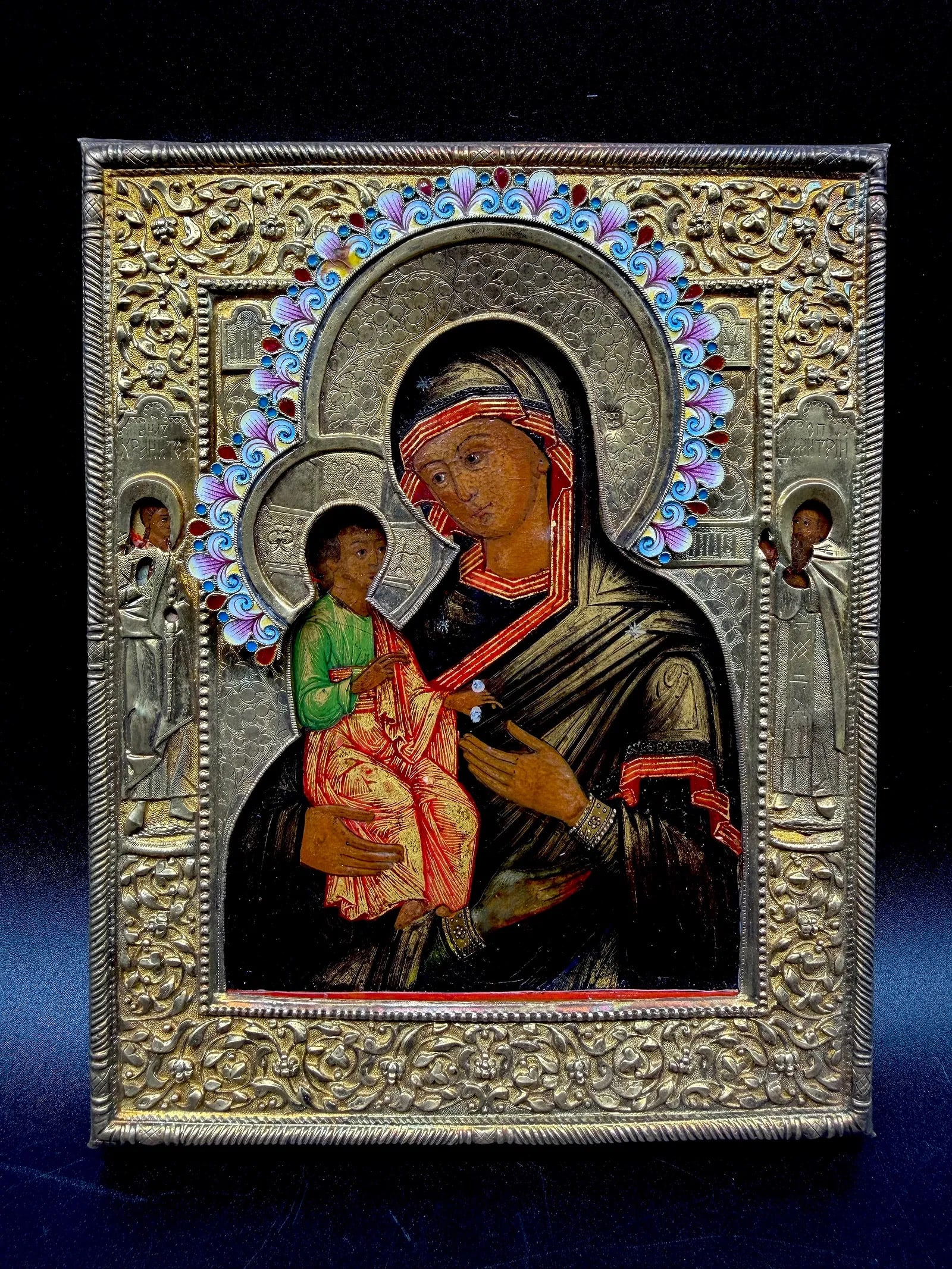 VIKTOR SAVINKOV: A Russian Silver-Gilt and Cloisonné Enamel Oklad Icon of the Hodegetria, 1872 (1 of 18)