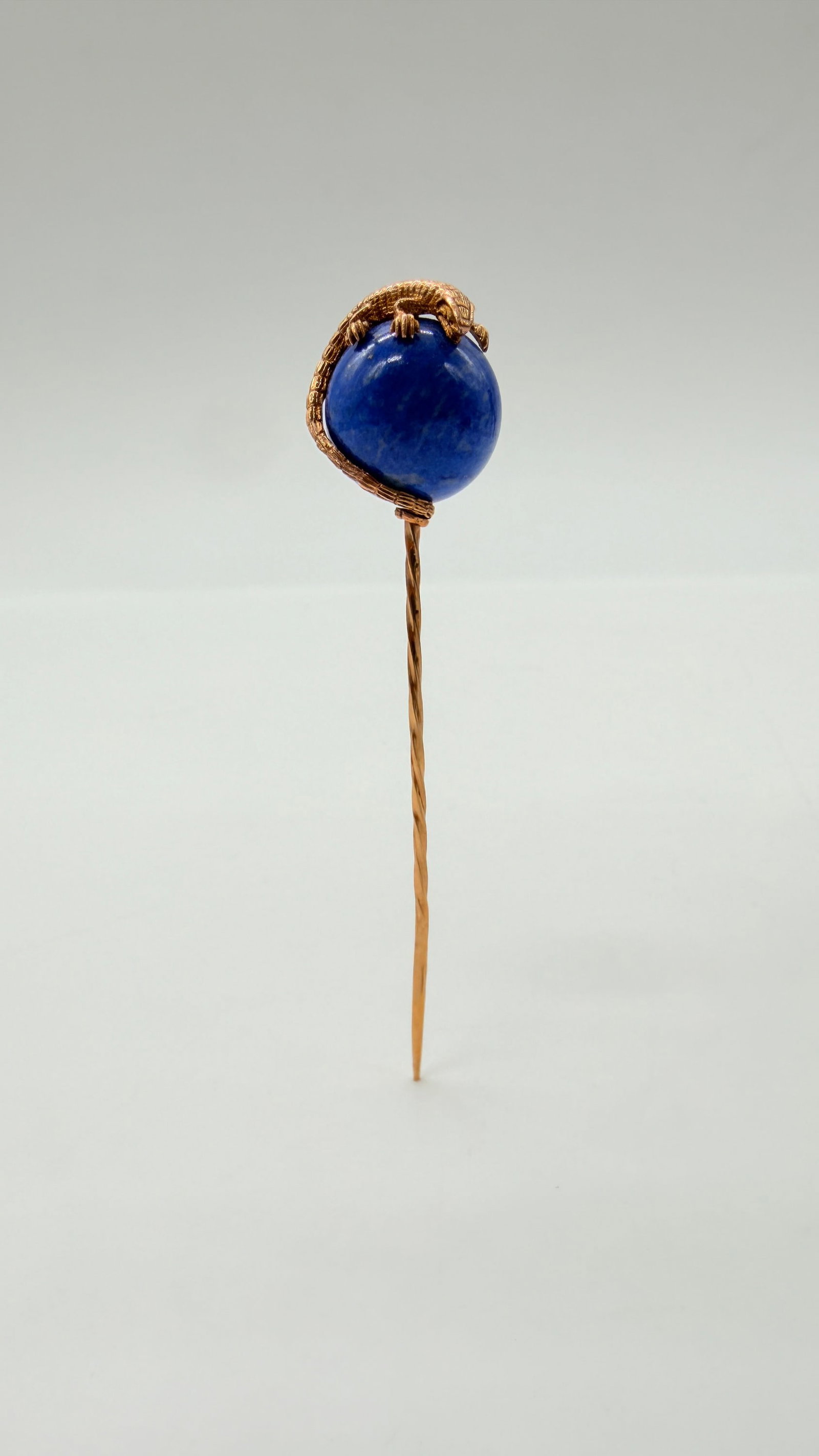 Fabergé, Russian Work, Late 19th–Early 20th Century, Lapis Lazuli and Gold Salamander Stick Pin: Fabergé Russian work, late 19th, early 20th century.Stick pin / tie pin in rose gold / yellow gold 56 zolotniks (14K) and lapis lazuli. The head is formed by a spherical lapis lazuli pearl encircled 