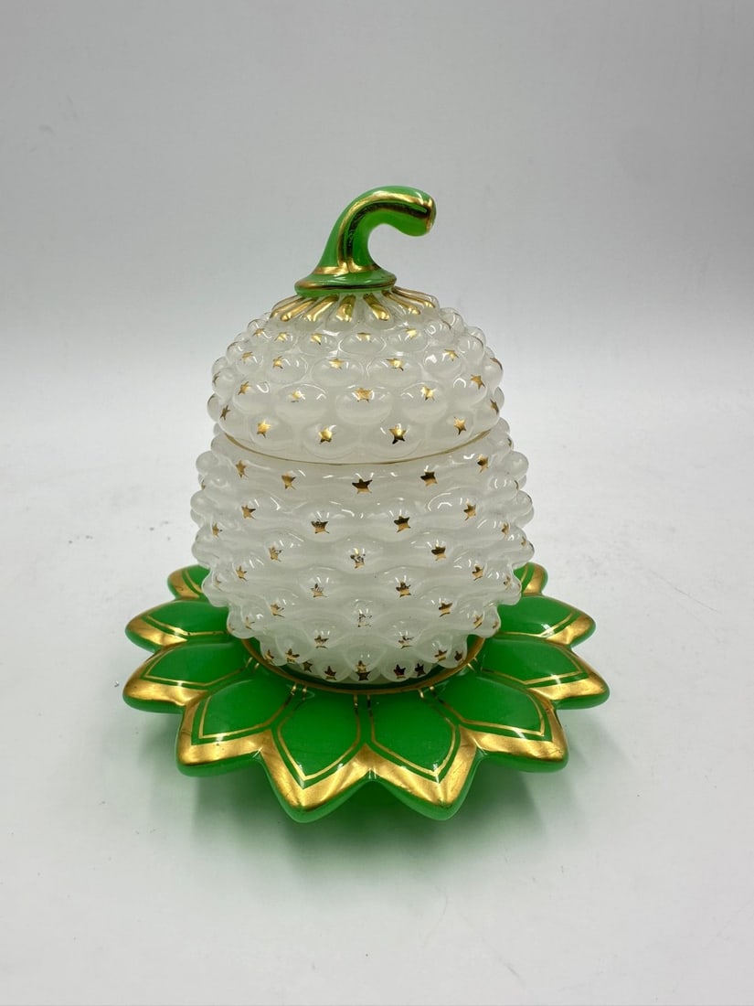 BACCARAT TWO-TONE 'PÂTE DE RIZ' AND URANIUM OPALINE GLASS PINEAPPLE-FORM COVERED BOX, CIRCA: Covered box or sugar bowl crafted in translucent, semi-opaque white opaline glass using the rare pâte de riz (rice paste) technique, molded in relief to resemble a textured pineapple or pinecone. The