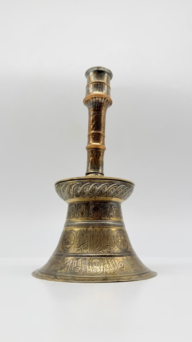 MAMLUK-REVIVAL BRASS CANDLESTICK WITH SILVER AND COPPER INLAY, EGYPT OR SYRIA, 19TH CENTURY (1 of 17)