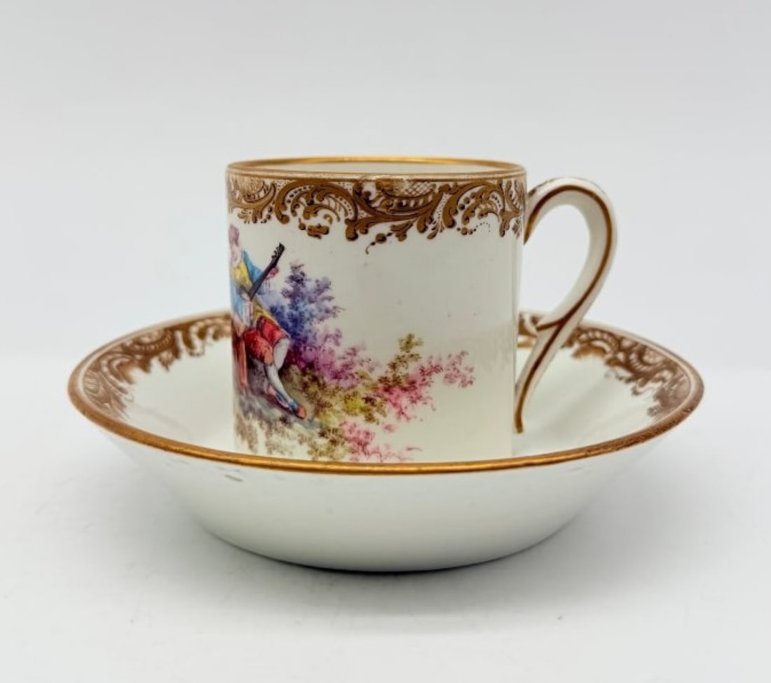Royal Sèvres Manufactory, Soft-paste Porcelain Litron Cup And Saucer, C. 1755: ROYAL MANUFACTORY OF SÈVRES (or VINCENNES)A one-litre cup and saucer in soft porcelain, with a polychrome decoration depicting a romantic scene of a young man playing the mandolin in a rural landscap