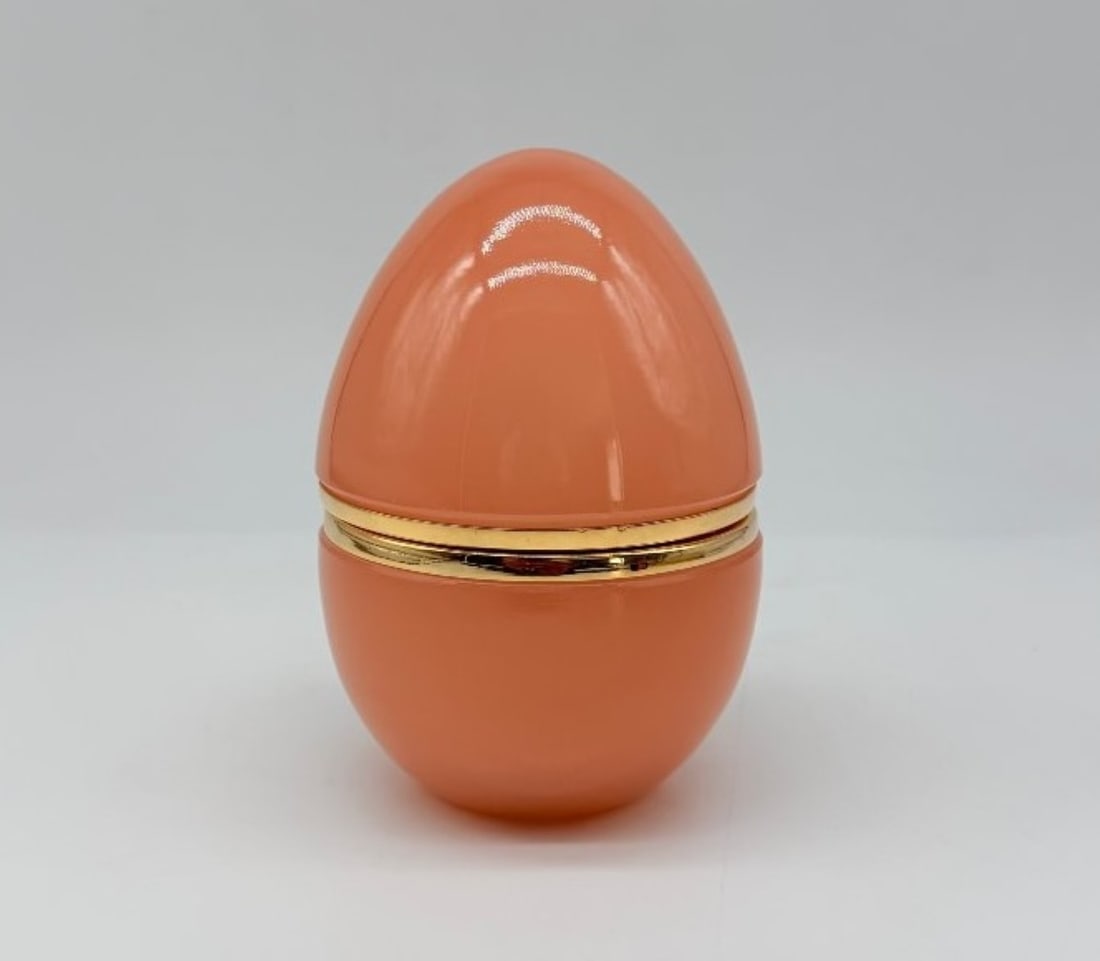 Egg-shaped Coral Opaline Covered Box With Gilt Bronze Mounts, Napoleon III: An ovoid (or egg-shaped) lidded box in coral-coloured opaline; the frame and hinge are in polished gilded bronze.France. Napoleonic III periodVery good condition.