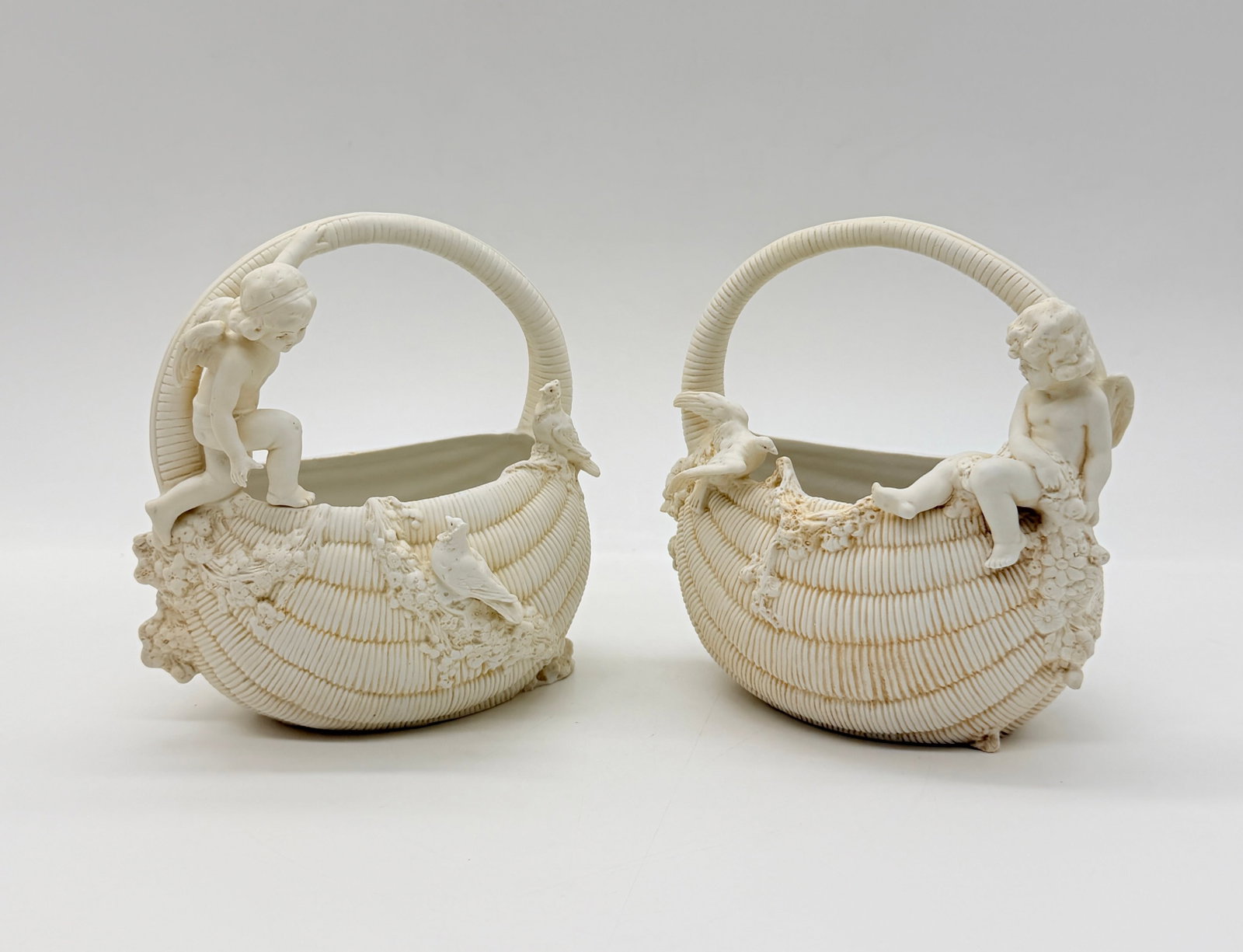 PAIR OF 19TH-CENTURY BISQUE PORCELAIN FIGURAL BASKETS (1 of 20)