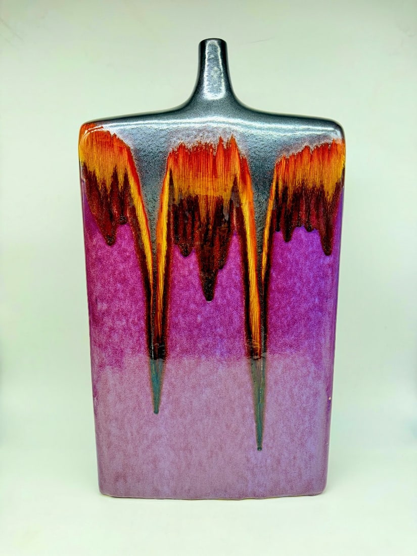 LARGE ART DECO CERAMIC FLASK VASE: Large Art Deco ceramic vase with a flat, flask-like rectangular form terminating in a short narrow neck. Features a rich glossy purple glaze accented on the upper portion with dripping, streaked glaze