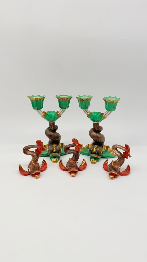 HEREND PORCELAIN DOLPHIN CANDELABRA AND CENTERPIECE SET (LOT OF 5): A rare 5-piece Hungarian hard-paste porcelain table service set by Herend, finely hand-painted with polychrome enamels and gilded highlights. The collection includes a pair of two-light candelabra wit
