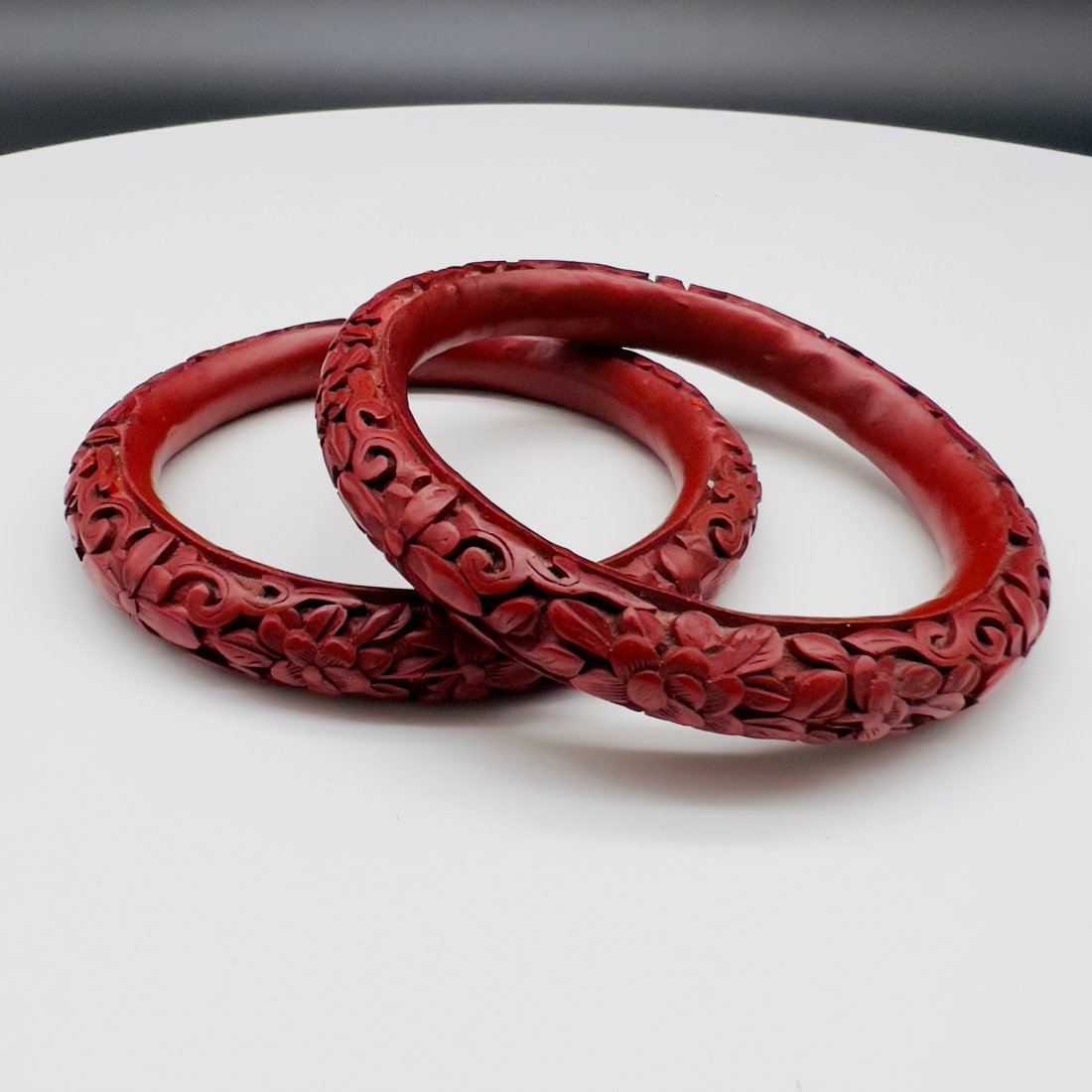 A PRETTY PAIR OF ANTIQUE VINTAGE HAND CARVED RED CINNABAR LACQUER BRACELETS (1 of 6)