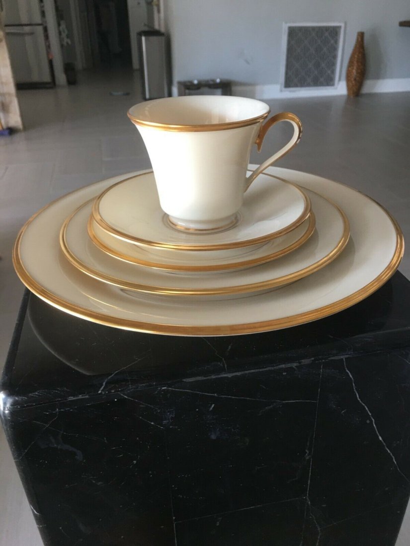 Lenox Eternal Complete Service for 15 Including Serving Plate 24 Karat Accent: Lenox Eternal Complete Service for 15 Including Serving Plate 24 Karat Accent. Condition is "used".New out of the box , beautiful classic setShimmering with 24-karat gold accents along the outer and i