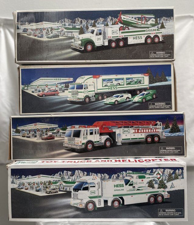 FOUR (4) HESS TOY TRUCKS YEARS 2000,2006,2002, 1997 NEW IN THE BOX (1 of 6)
