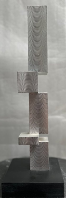 GINO LORCINI (b1923) ALUMINUM SCULPTURE "REVOLVING II" 13 X 4 X 4: GINO LORCINI (b1923) ALUMINUM SCULPTURE "REVOLVING II" 13 X 4 X 4 1973 PROVENANCE: MARLBOROUGH - GODARD GALLERY , ADELE COLLECTION, WPB & CANADA Gino Lorcini (Born 1923) is active/lives in Ontario, Qu