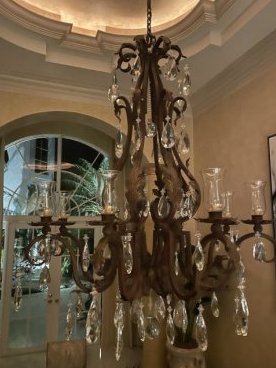 STUNNING LARGE DANA CREATH HAND FORGED HANGING CRYATAL IRON /BRONZE CHANDELIER: DESCRIPTION: LARGE DANAC REATH HAND FORGED HANGING CRYATAL IRON /BRONZE CHANDELIER CIRCA: 1990s ORIGIN: UNITED STATES DIMENSIONS: H: 49" x W: 42" Provenance: (The Perkins Collection, DELAWARE ) Have a