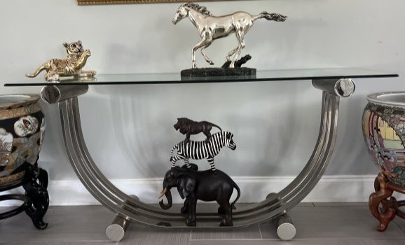 CONSOLE TABLE GLASS TOP AND ALUMINUM BASE SZ 59" WIDE 18" DEEP 26" TALL: CONSOLE TABLE GLASS TOP AND ALUMINUM BASE SIZE 59" WIDE 18" DEEP 26" TALL. WE OFFER FREE PICK UP OR OUR IN-HOUSE PREFERRED SHIPPER IS UPS #4825 Starr Almeida 561-422-3305, CALL STARR WITH YOUR LOT NUM