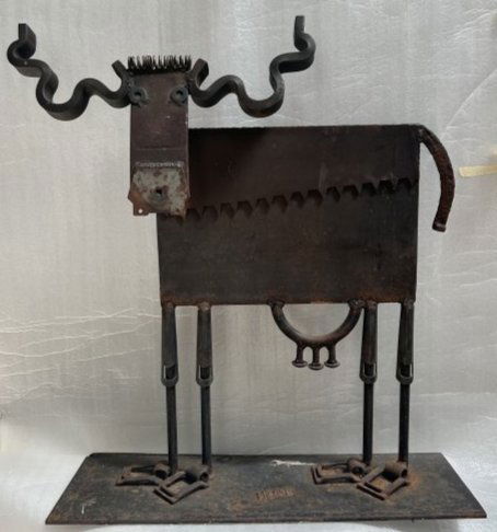 BILL HEISE (AMERICAN 1943-2011) METAL SCULPTURE COW FROM SALVAGED METAL: BILL HEISE (AMERICAN 1943-2011) METAL SCULPTURE COW FROM SALVAGED METAL, SIGNED HEISE AT BASE . IRON AMD MIXED METAL 27" TALL 24" WIDE. WE OFFER FREE PICK UP OR OUR IN-HOUSE PREFERRED SHIPP