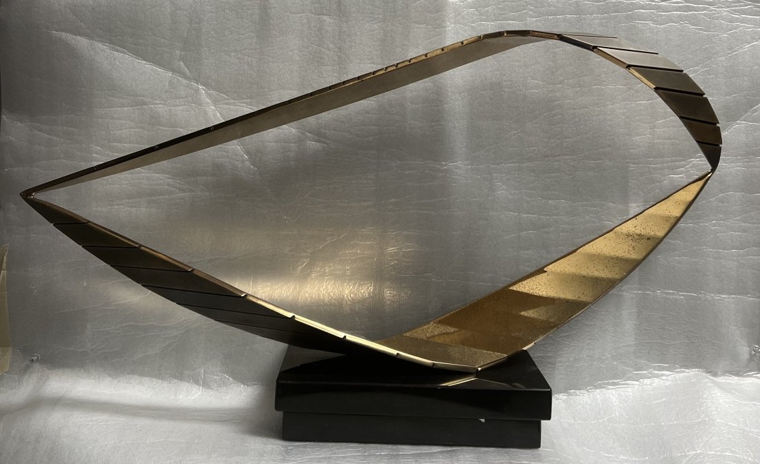 LARGE STUDIO MID CENTURY BRASS AND STONE GEOMETRICAL TABLE CENTER PIECE: LARGE STUDIO MID CENTURY BRASS AND STONE GEOMETRICAL TABLE CENTER PIECE STATUE 16" TALL 28" WIDE 5" DEEP WE OFFER FREE PICK UP OR OUR IN-HOUSE PREFERRED SHIPPER IS UPS #4825 Starr Almeida, EMAIL STARR