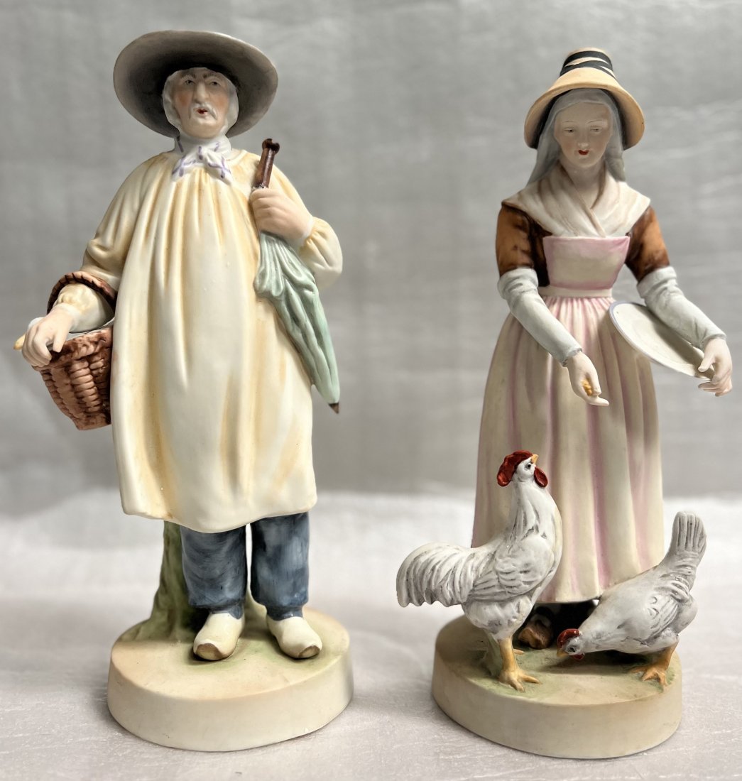 VINTAGE PAIR OF ANDREA BY SADEK FIGURINES MAN AND A WOMEN FEEDING THE CHICKENS: Add a touch of nostalgia to your home decor with this vintage pair of Andrea by Sadek figurines. The charming man and woman are depicted feeding their chickens, and are beautifully crafted in ceramic 