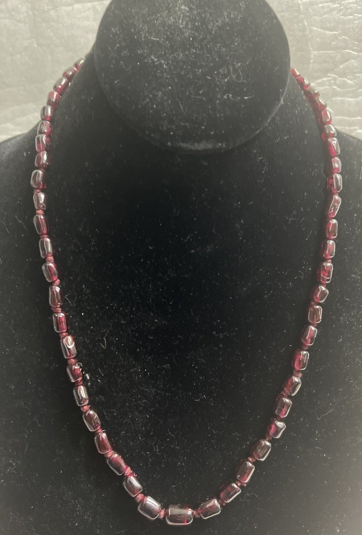 NECKLACE SEMIPRECIOUS STONES GARNET BEADS FROM A RETIRED DEALER 20": Add a touch of vintage charm to your jewelry collection with this beautiful red garnet necklace. The necklace features round, beaded garnet stones that are perfect for adding a pop of color to any out