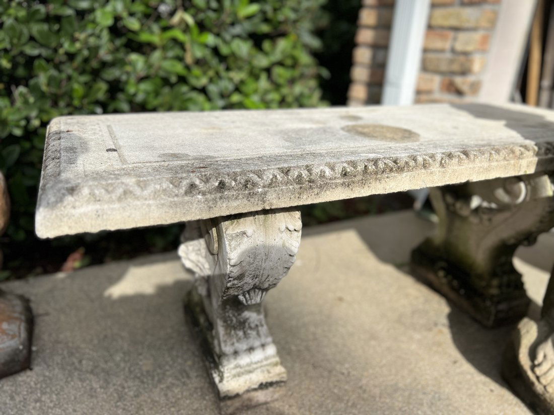 A WEATHERED CEMENT GARDEN BENCH (1 of 4)