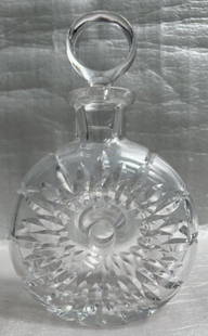 ATLANTIS HAND CRAFTED CRYSTAL ROUND LIQUOR DECANTER WITH STOPPER , PORTUGAL: Add a touch of elegance to your bar with this hand-crafted crystal round liquor decanter from the 1970s. The clear crystal decanter, made in Portugal by Atlantis, features a round shape and comes with