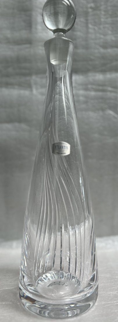 ATLANTIS HAND CRAFTED CRYSTAL TALL LIQUOR DECANTER WITH STOPPER , PORTUGAL: Add a touch of luxury to your bar with this exquisite hand-crafted crystal liquor decanter from Atlantis. Made in Portugal, this tall decanter features a clear color that complements any barware colle