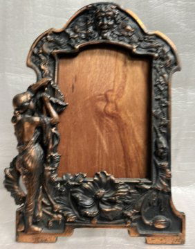 antique art nouveau cast metal copper frame with women flowers and face on top