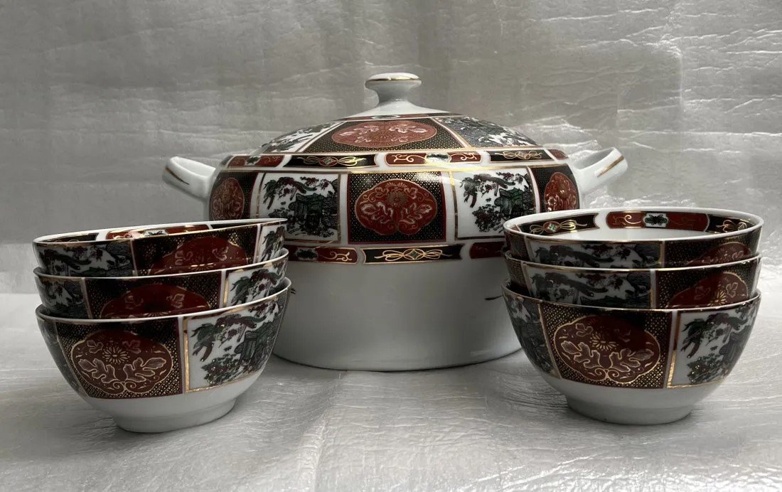 MID CENTURY MOROCCAN PORCELAIN SOUP TUREEN WITH 6 MATCHING BOWLS BEAUTIFUL DETAIL: This beautiful mid-century soup tureen with matching bowls is designed with an abstract pattern, round shape, and multicolor finish. The tureen is made of porcelain material with an embossed finish an
