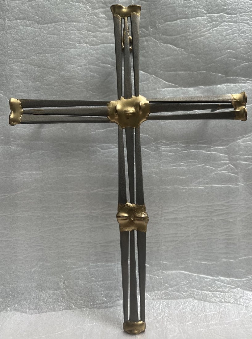CROSS STEEL NAIL BRUTALIST MID CENTURY MONDERN CHRISTEN CHURCH: This cross is a unique piece that combines the industrial look of steel nails with a mid-century modern design. It is handmade and its exact origin is unknown, adding to its mysterious charm. The cros