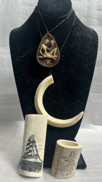 ASSORTMENT OF TIBETAN BONE ITEMS 2 NECKLACES AND DECORATIVE ITEMS: This unique collection features two beautiful Tibetan bone necklaces and several decorative items. The intricate designs and use of bone as material make this set stand out. The necklaces are a perfec