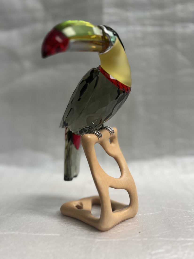 Swarovski Crystal Toucan Chrome Green #850600 Large Toucan Bird MIB: This Swarovski crystal figurine is a stunning representation of a toucan with vibrant chrome green colors. The piece stands tall at 8 inches and has a length of 2 inches, making it a large and eye-cat