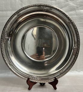 Sterling Silver Serving Tray  14" W Approximate weight 538 Gram: This stunning sterling silver serving tray is a timeless piece that will add elegance to any occasion. Crafted by Wallace Silversmiths, this medium-sized tray measures 14 inches in width and weighs ap