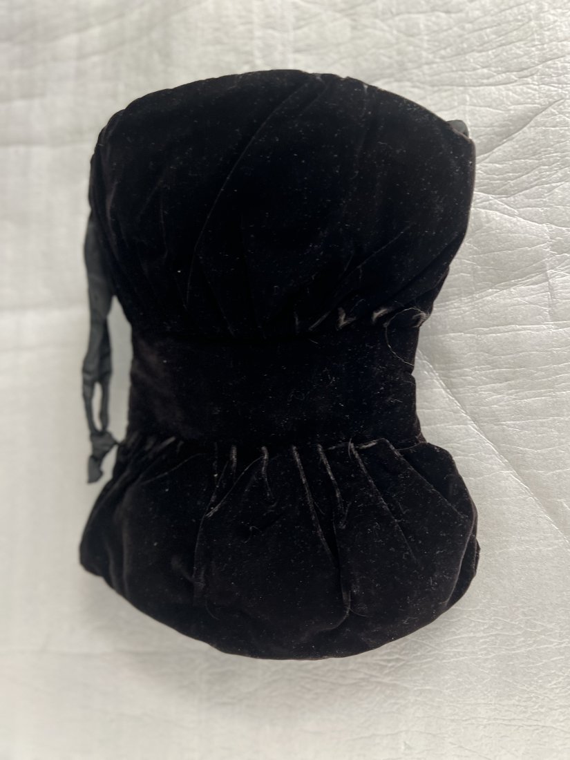 Vintage Black Velvet Corset: This vintage black velvet corset is a true treasure for any fashion enthusiast. Its timeless design and high-quality materials make it a must-have item for your collection. The corset comes in a class
