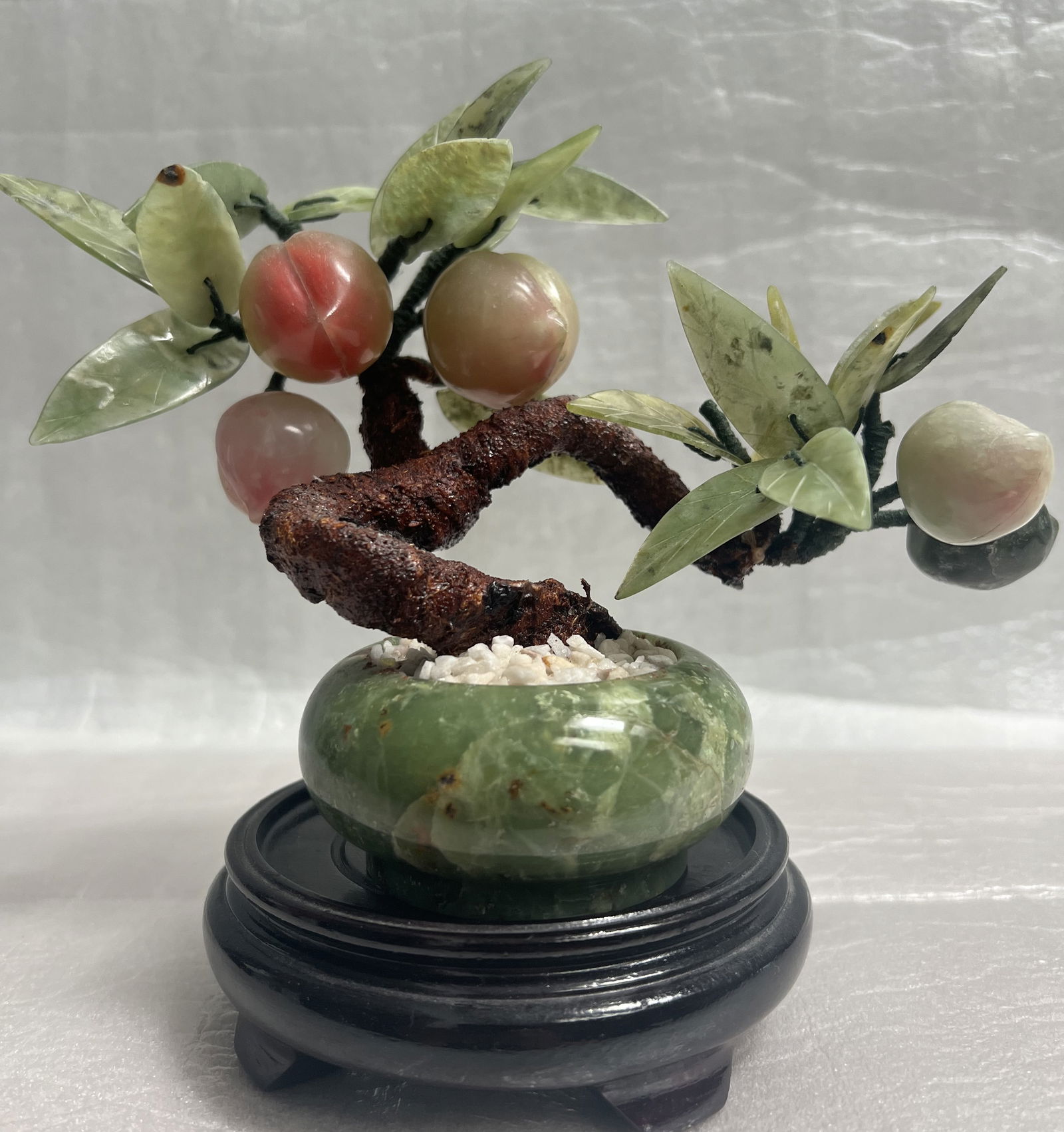 Vintage Chinese Jade Leaf and Stone Peach Bonsai Tree , Gree Onyx Pot: This beautifully crafted Chinese Jade Leaf and Stone Peach Bonsai Tree with a Green Onyx Pot is a vintage piece that will add a touch of elegance to any room. The intricate details and vibrant colors