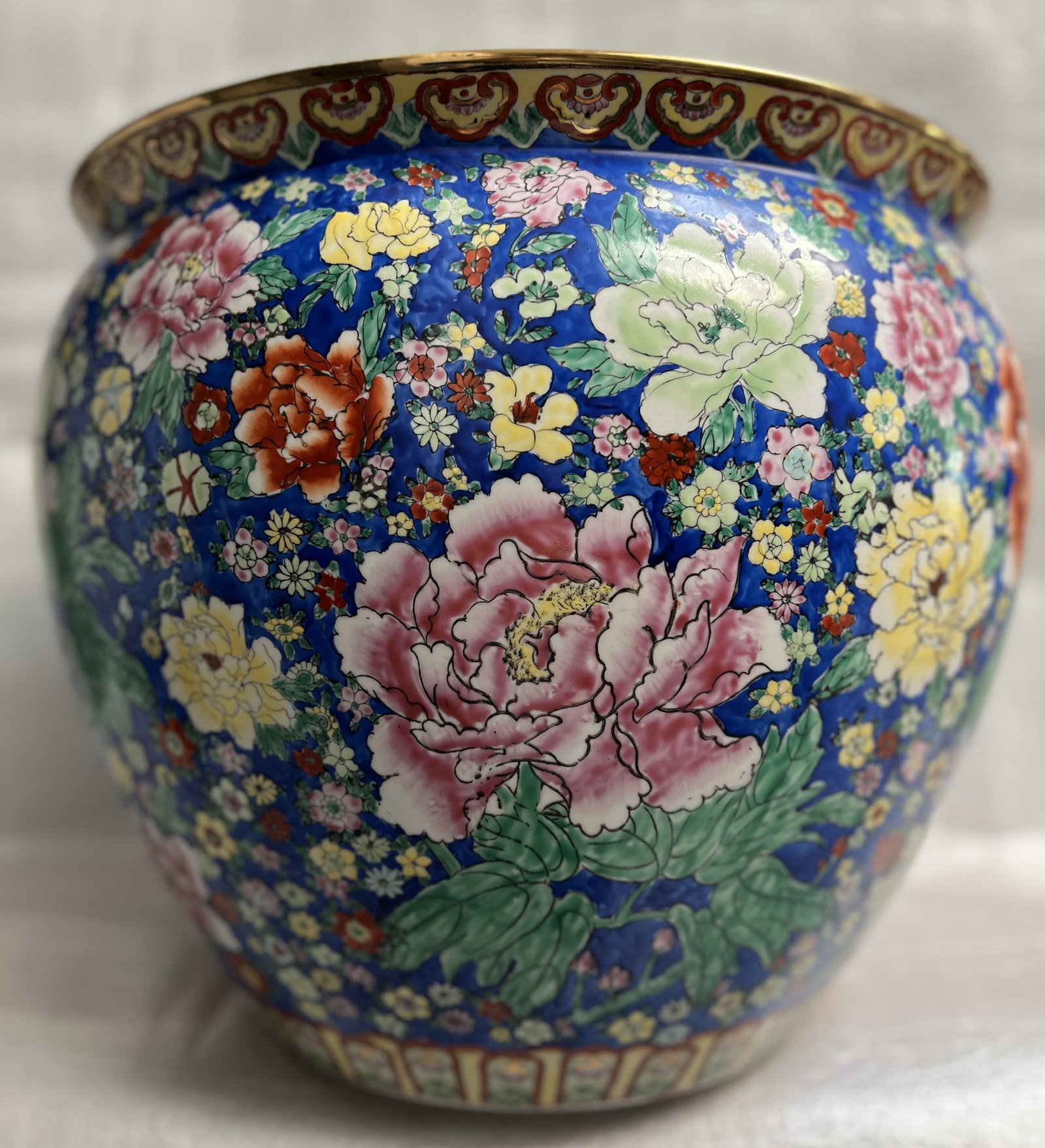 CHINESE PAINTED PORCELAIN FISH BOWL: This beautiful fish bowl is a true piece of art. With intricate Chinese paintings on porcelain and pottery, it is a vintage original that will add elegance to any collection. The bowl is perfect for s