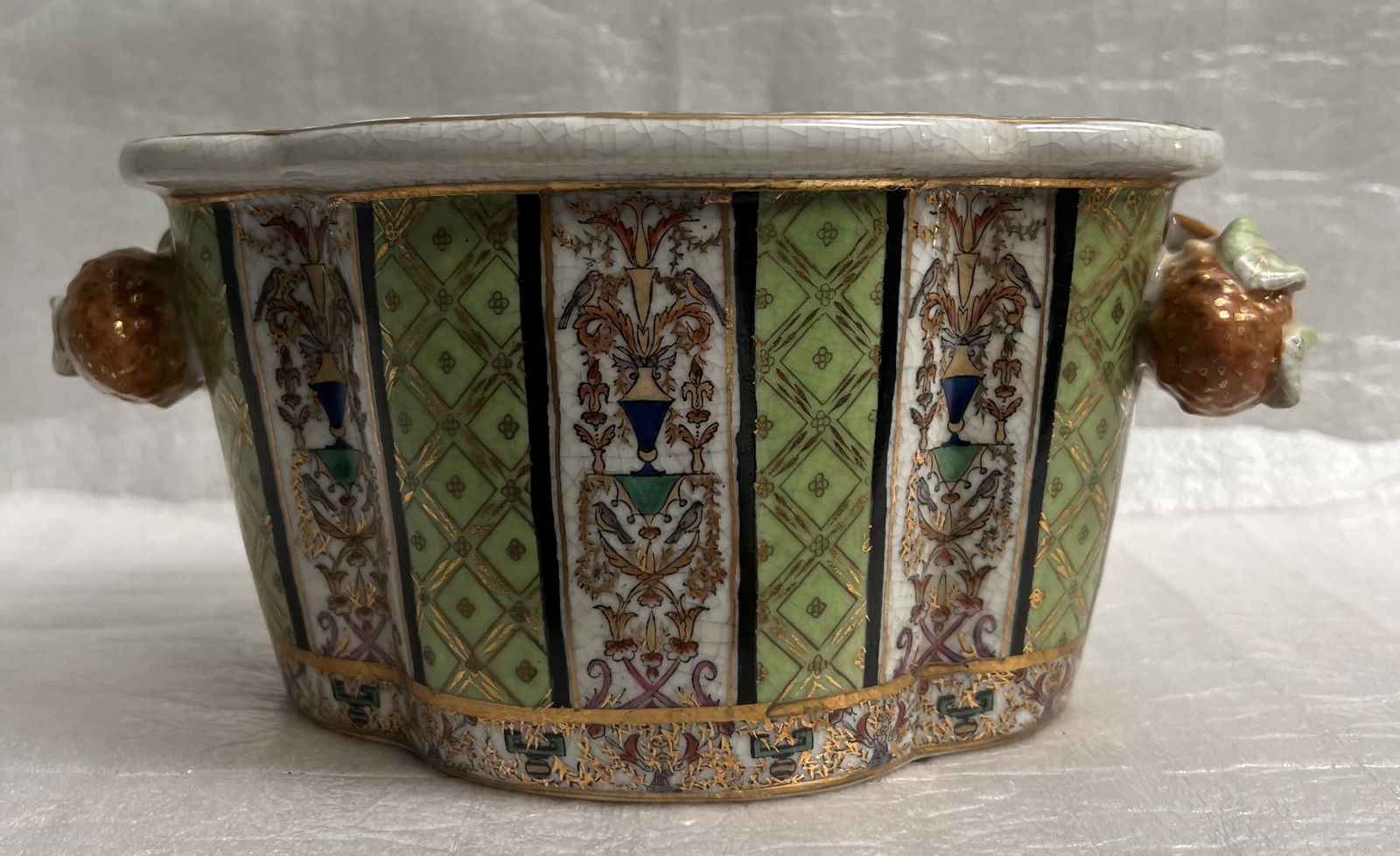 UNITED WILSON JUWC 1897 VINTAGE CHINESE PORCELAIN BUTTERFLY PLANTER BOWL: This vintage Chinese porcelain planter bowl is a beautiful addition to any collection. The oval shape provides a unique touch, while the colorful butterfly design adds a pop of color. The item height