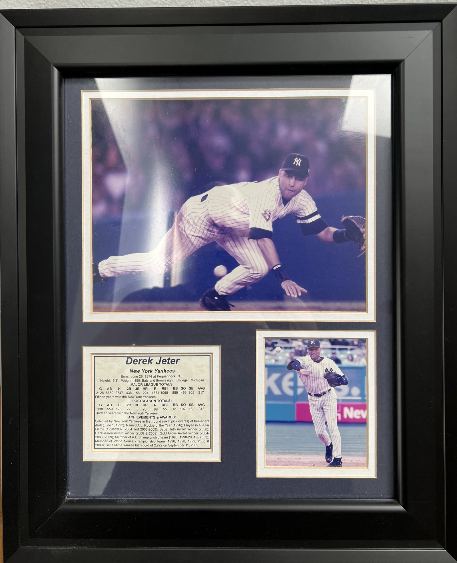 DEREK JETER NY YANKEEYS . FRAMED PICTURES AND STATS: This framed print featuring baseball legend Derek Jeter is sure to be a standout addition to any collection. The print measures 17 inches tall by 14 inches wide and is oriented in portrait format. Pro