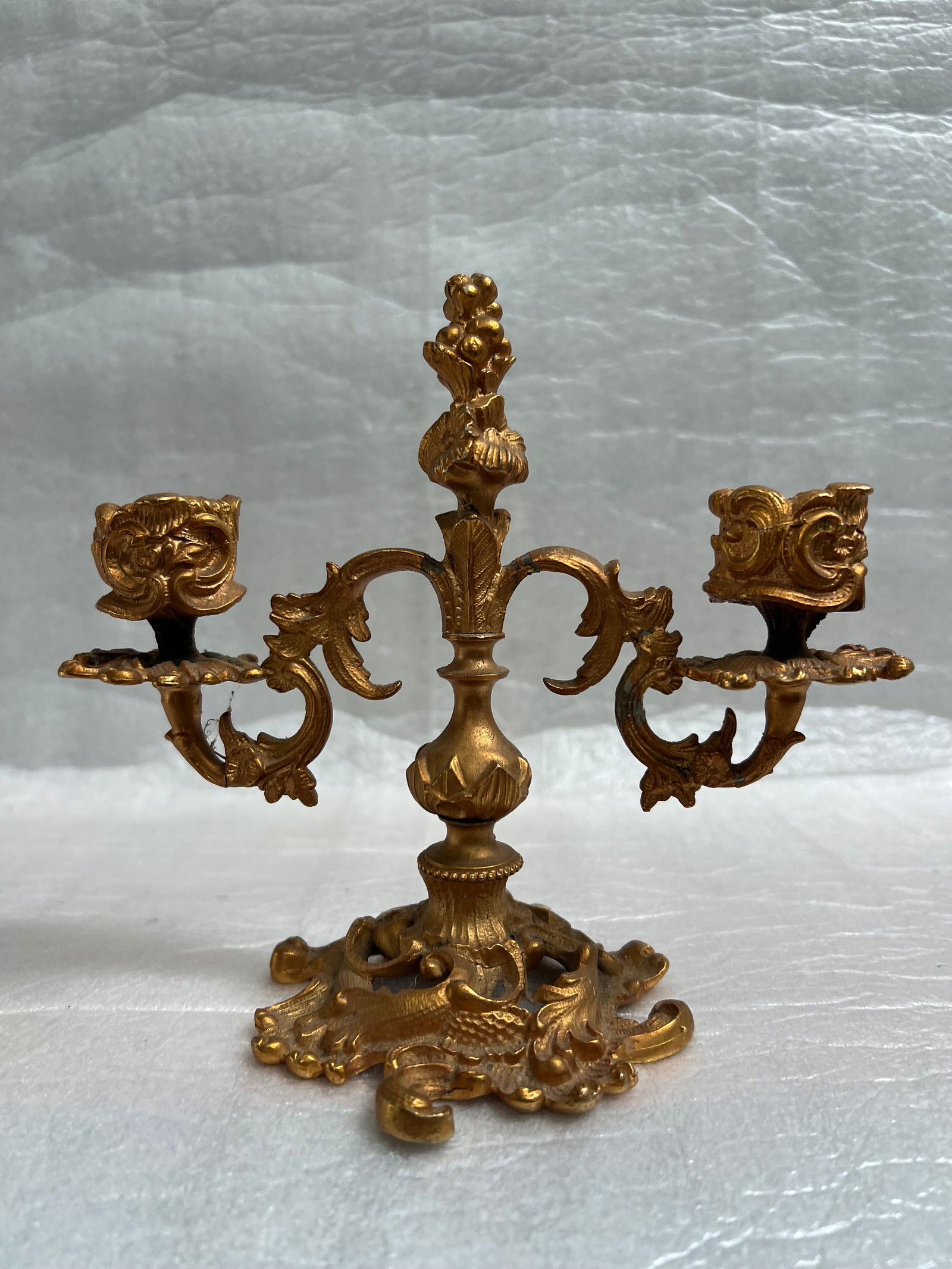 French Brass/Metal Candle Holder: Add a touch of elegance to your home decor with this stunning French Brass/Metal Candle Holder. Perfect for all occasions, this candle holder will make your dinner parties and gatherings more special.