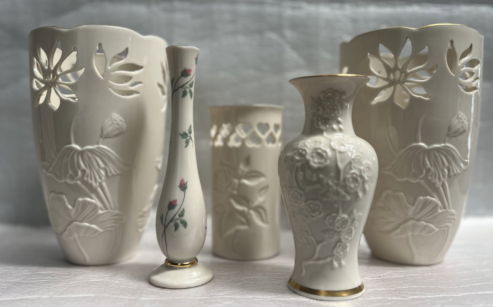 Collection of 5 Lenox Feathered Pedistal Vases: Add a touch of elegance to your home decor with this collection of 5 Lenox feathered pedestal vases. Crafted in the United States during the 1970s, these vases feature a contemporary style that is per