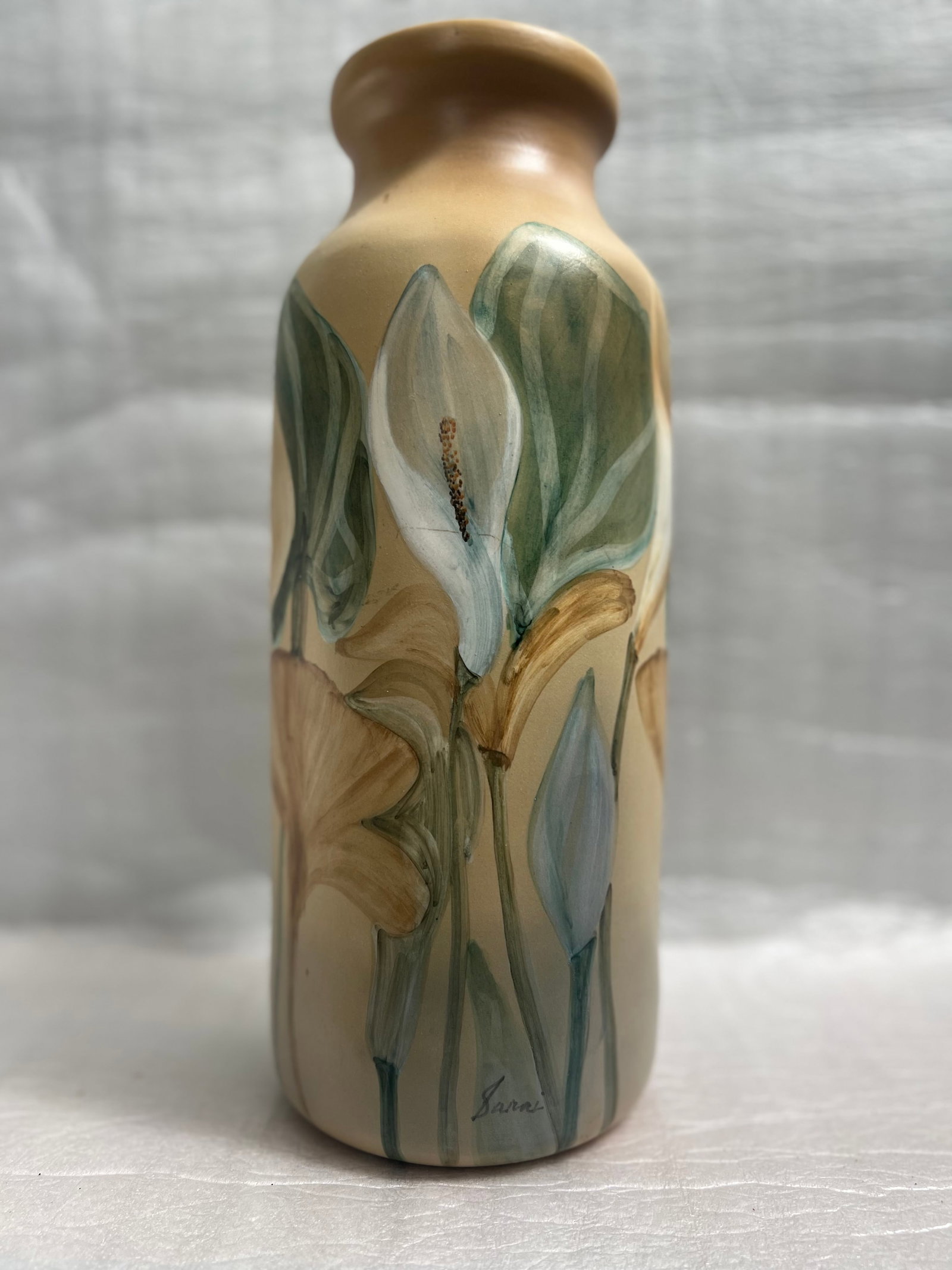 HAND PAINTED FLORAL VASE , VASE SIGNED BY THE ARTIST VASE 14" T: This stunning vase is a true work of art. The hand-painted floral design is a beautiful addition to any decor. The vase is signed by the artist and stands at 14 inches tall. Crafted from hand-blown gl