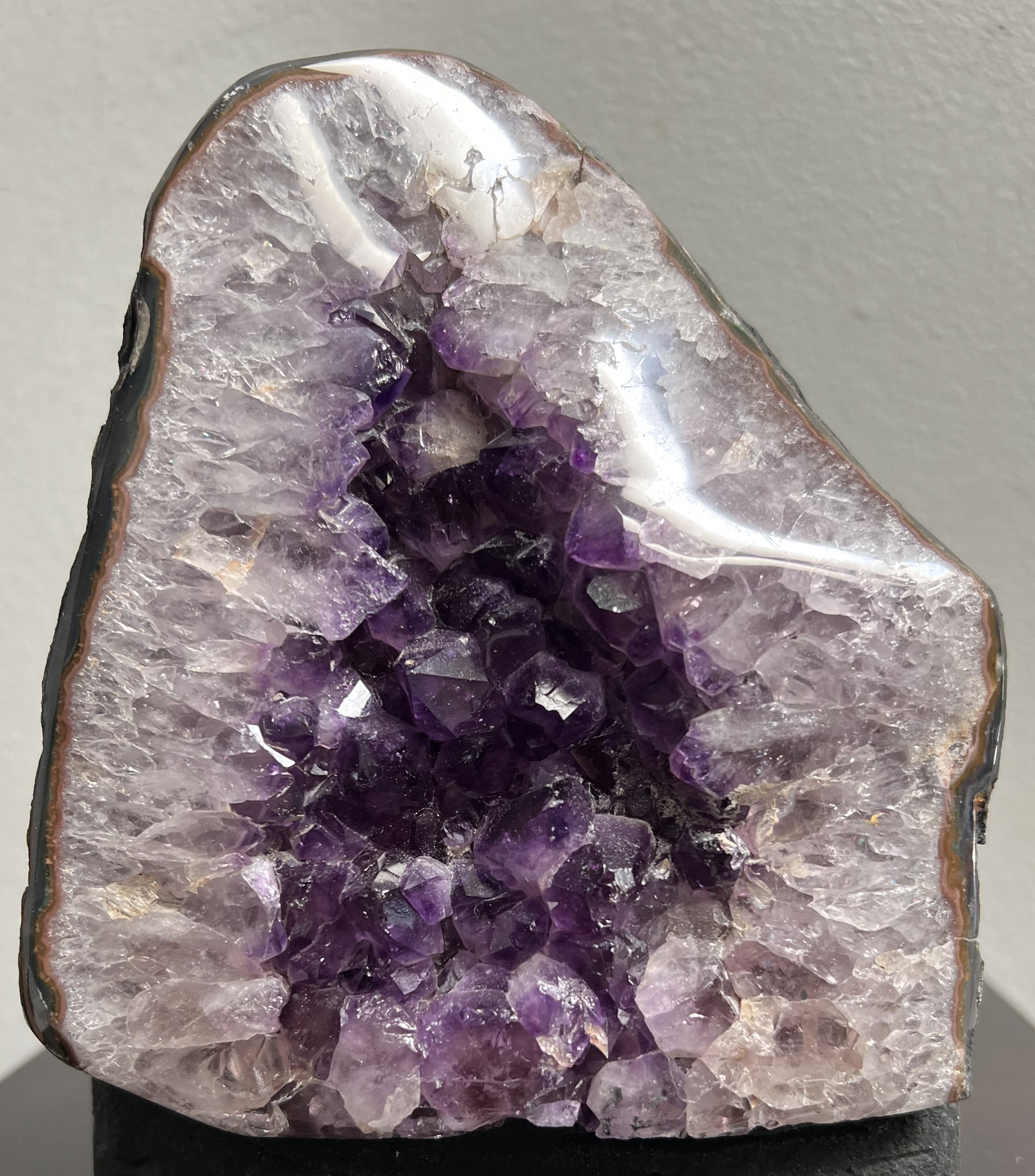 Stunning Unique Large Natural Purple Amethyst 9" T 6" W: This stunning natural purple amethyst is a one-of-a-kind crystal that will make a beautiful addition to any collection. Measuring 9 inches in Hight and 6 inches in width, this crystal has a unique and