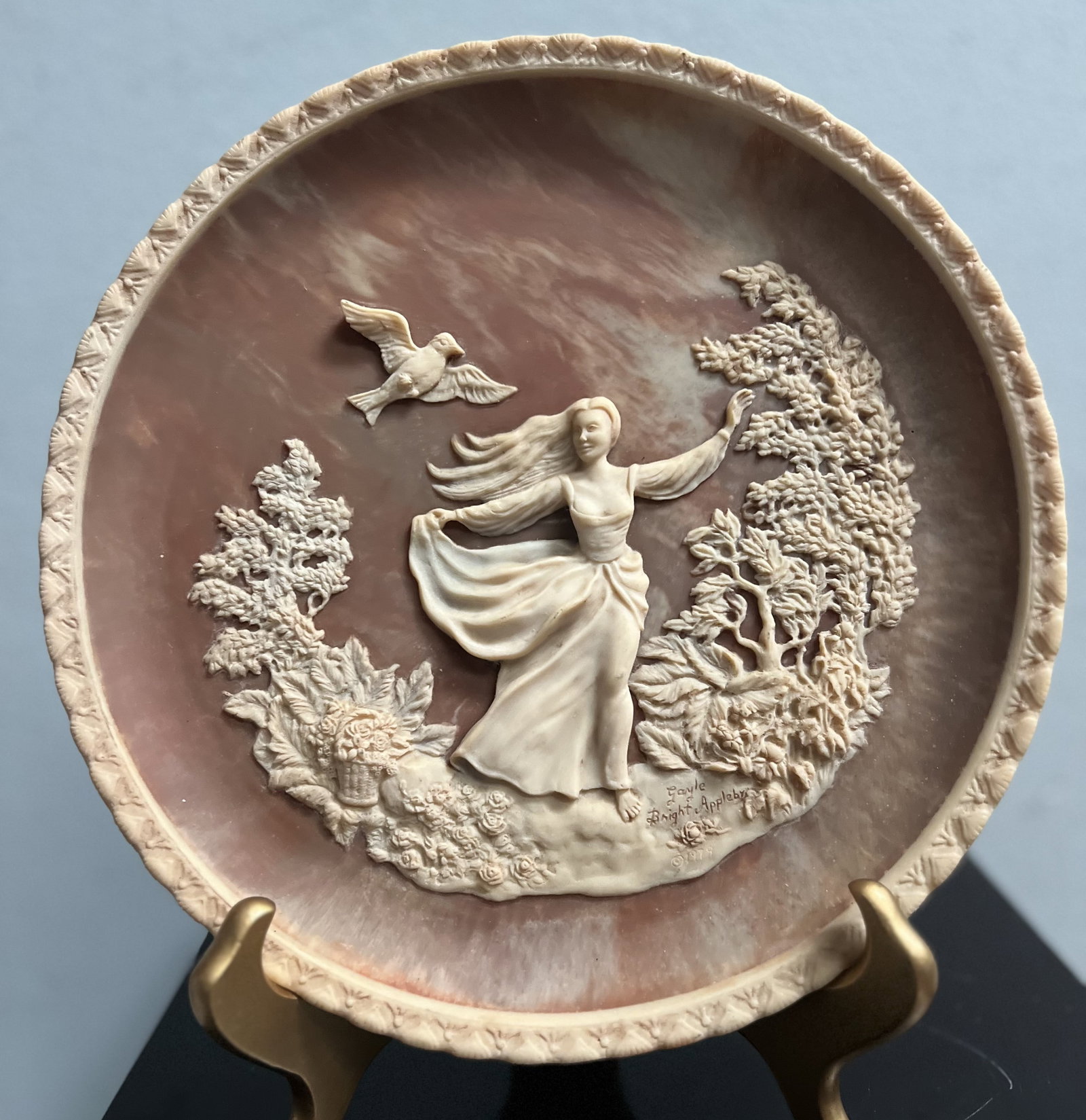 Sculptured Plate by Gayle Bright Appleby Limited Edition Signed Numbered: Elevate your collection with the Sculptured Plate by Gayle Bright Appleby, a limited edition piece that exudes Art Deco elegance. Crafted from alabasta with a soothing beige hue, this collector's item