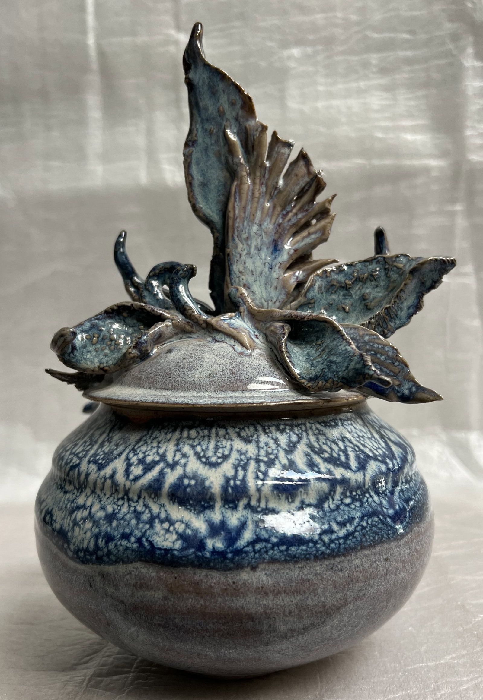 Nancy Stoop Art Pottery Trinket Dish with Flower Top: Embrace the charm of Art Deco with this Nancy Stoop art pottery trinket dish, a perfect addition to any collector's array or a unique accent for your home. Showcasing a delightful floral pattern, this