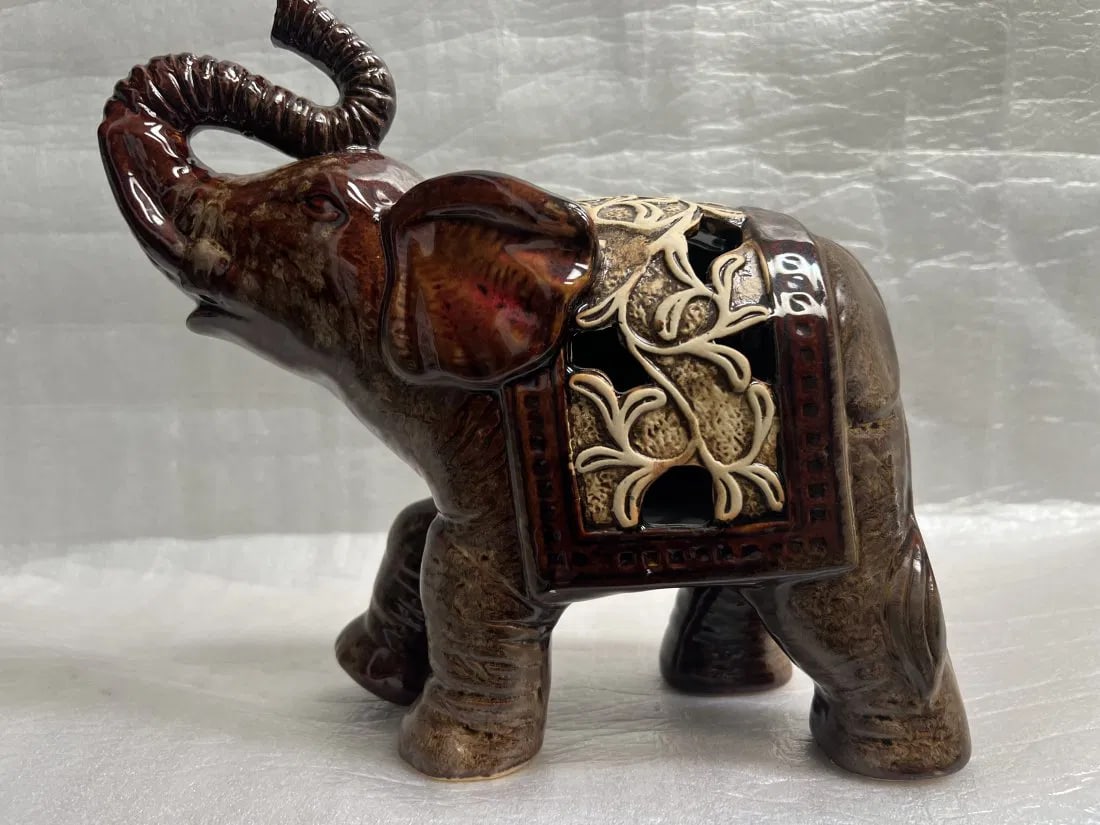 CERAMIC ELEPHANT VINTAGE " LUCKY WEALTH ELEPHANT, BEAUTIFUL DETAIL: This vintage ceramic sculpture depicts a beautiful and detailed elephant, believed to bring luck and wealth to its owner. Created in a contemporary style, this piece is crafted from high-quality ceram