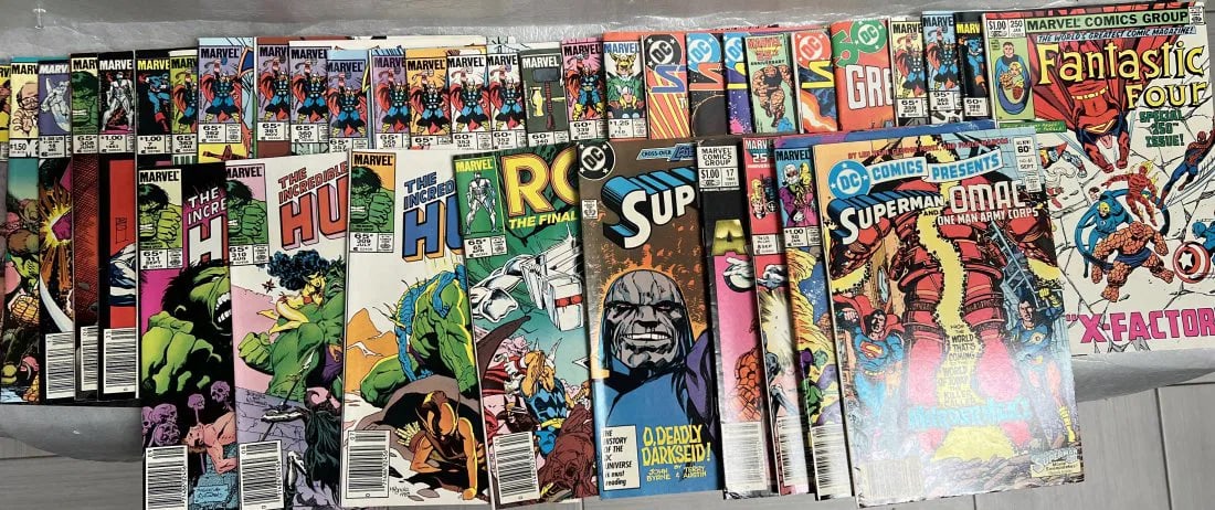 Collection of 37 Comic Books from the 1980s DC & Marvel794: This collection includes 37 comic books from the 1980s featuring popular characters from DC Comics and Marvel. The comics were all manufactured in the United States and are in excellent condition, rea