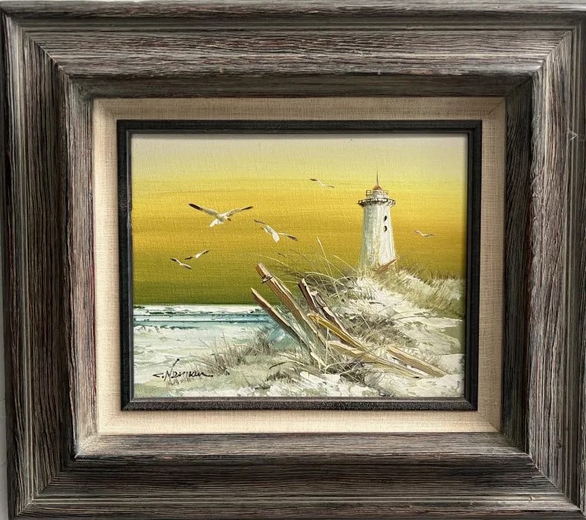 STUNNING OIL ON CANVAS LIGHTHOUSE BY THE OCEAN SIGN BY THE ARTIST "NEIMAN: STUNNING OIL ON CANVAS LIGHTHOUSE BY THE OCEAN SIGN BY THE ARTIST "NEIMAN" IMAGE 10" X 8" FRAMED 17" X 15"