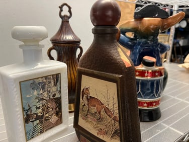 A Collection of 8 Vintage Jim Beam Collectors Bottles Circa 1950s