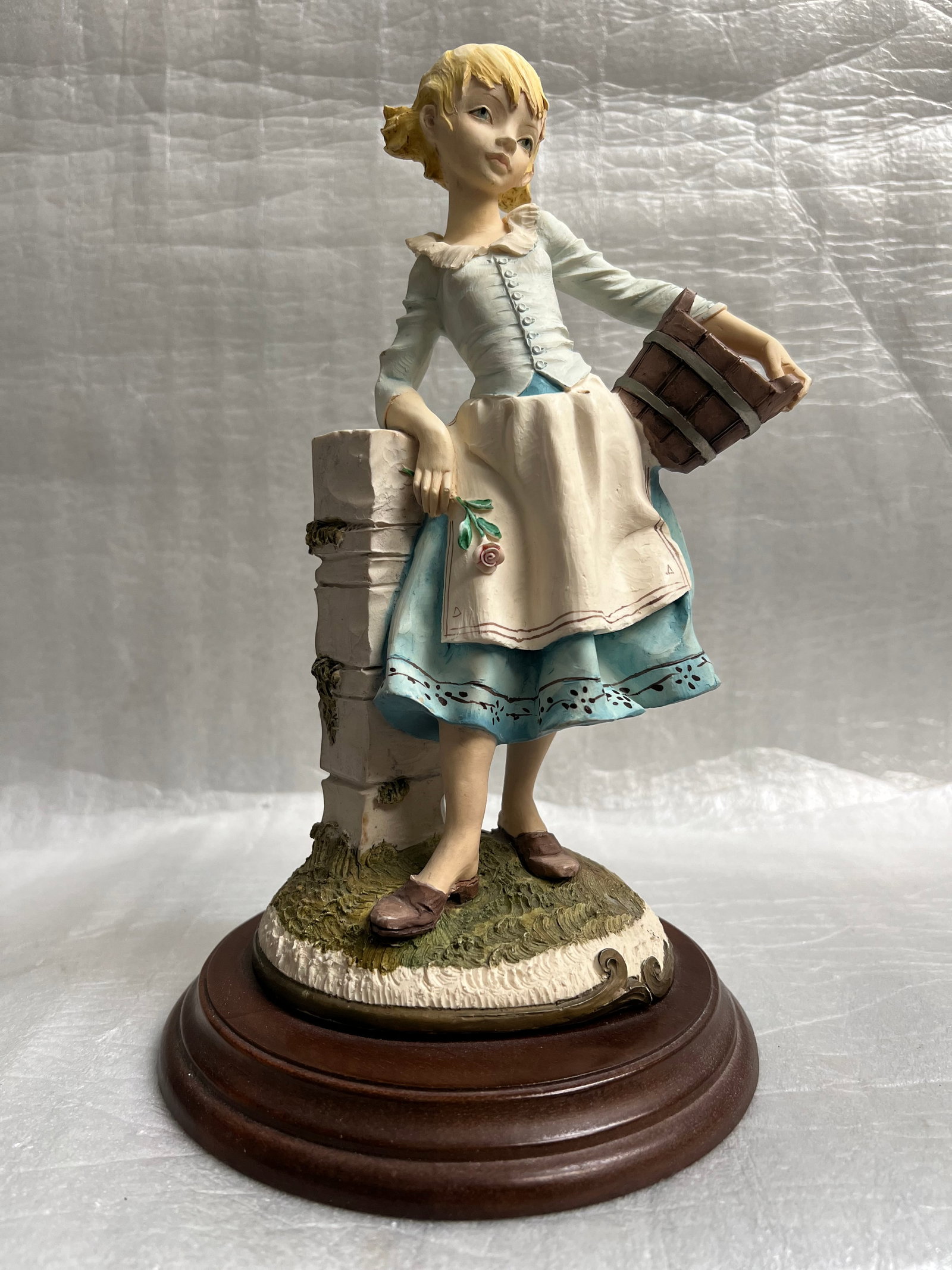 Large Porcelain Capidimonte Figurene 11" T 7" W: This Large Porcelain Capidimonte Figurine stands at 11" tall and 7" wide, featuring an All-Over pattern in a vibrant multicolor design. Made of porcelain and ceramic in a contemporary style, this coll