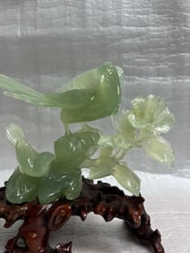 Chinese Light Green Jade Carving Featuring Birds and Flowers on a Wood Base